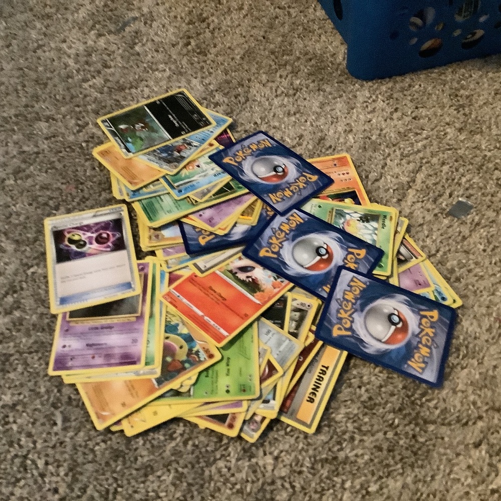 A bunch of different Pokémon cards